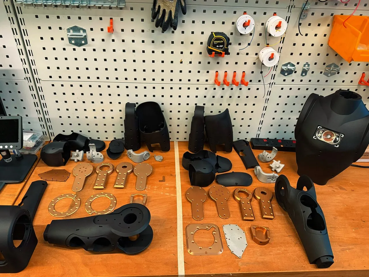 Asimov 1 parts laid out on a workbench