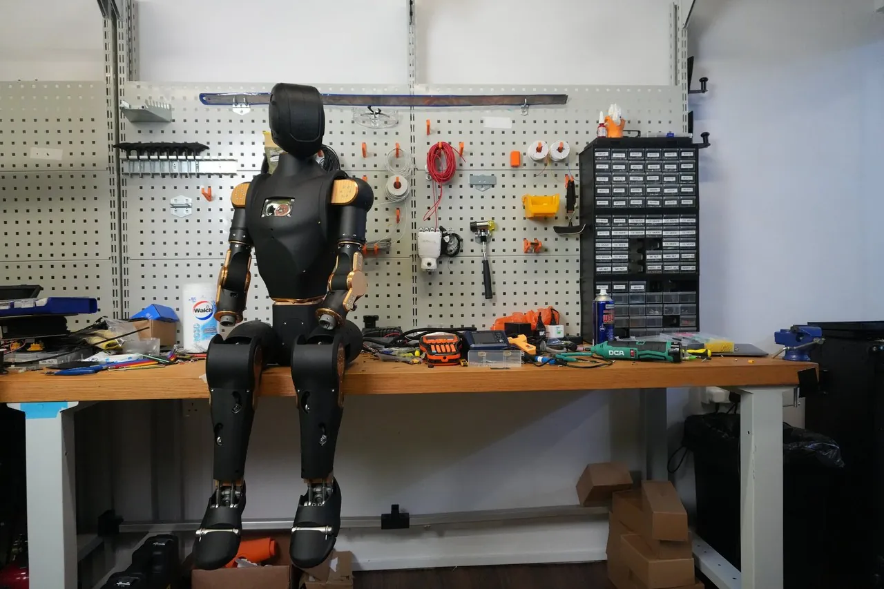Asimov 1 humanoid robot assembled on a workbench