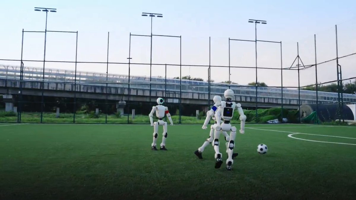 PHYBOT humanoids play football in dynamic environments