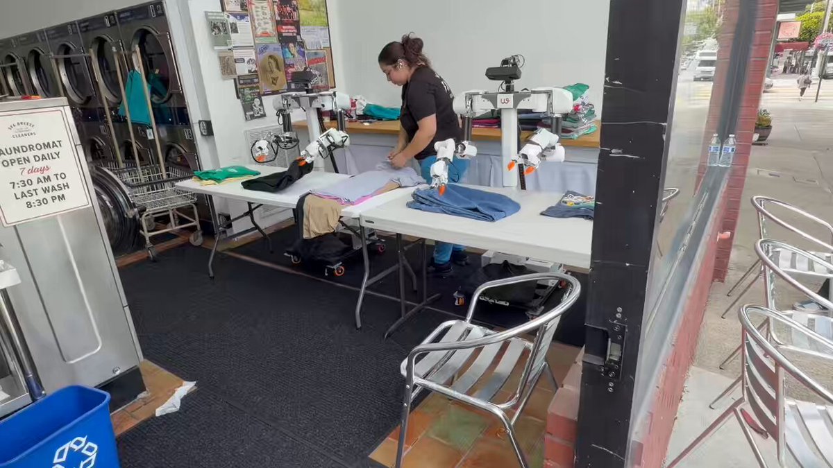 Dual-arm robot works in a laundry