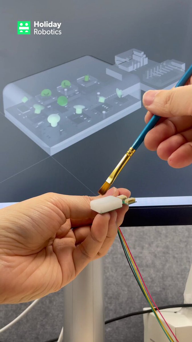 Holiday Robots tactile sensors let a robot feel paintbrush contact