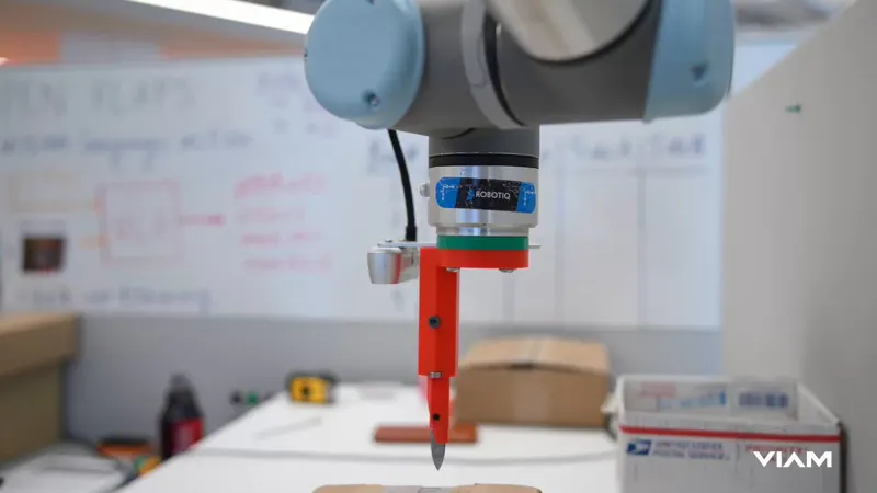 BoxBot Splits Box Opening Between Visual Servoing and a Small VLA