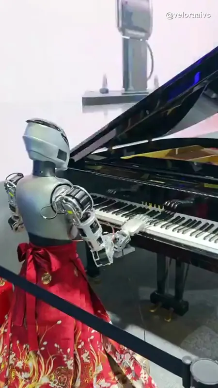 Robot pianist plays a grand piano with metal fingers