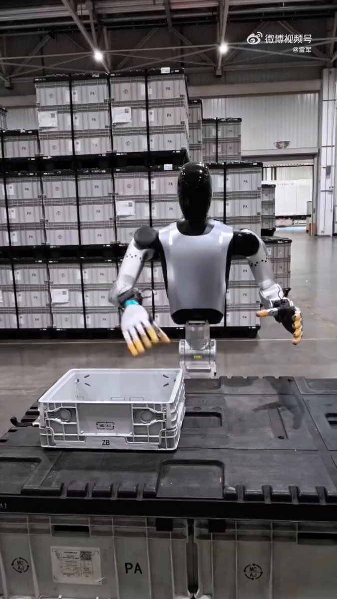 Xiaomi Humanoid Robots Handle Factory Tasks & Film Each Other